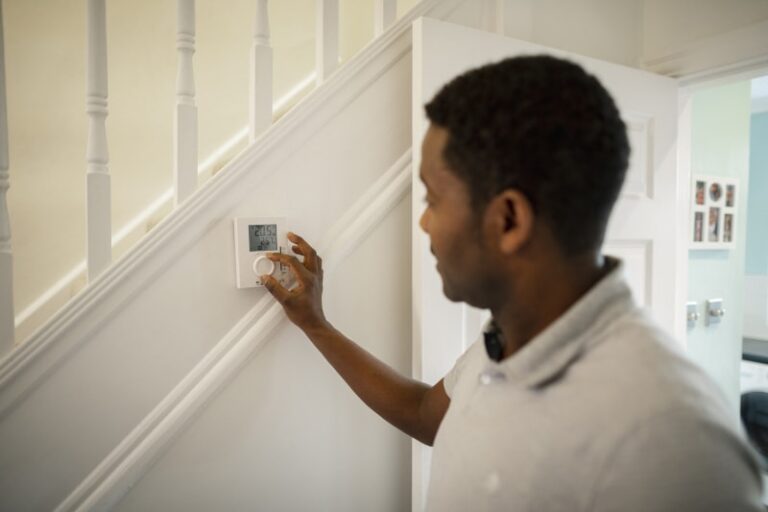Pressing AC Thermostat